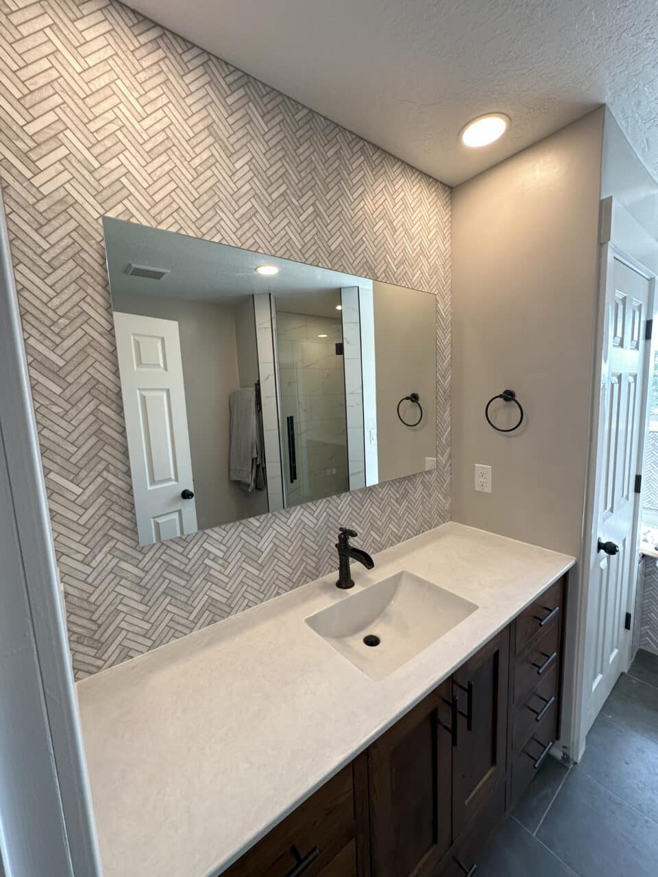 Photo of herringbone accent wall bathroom