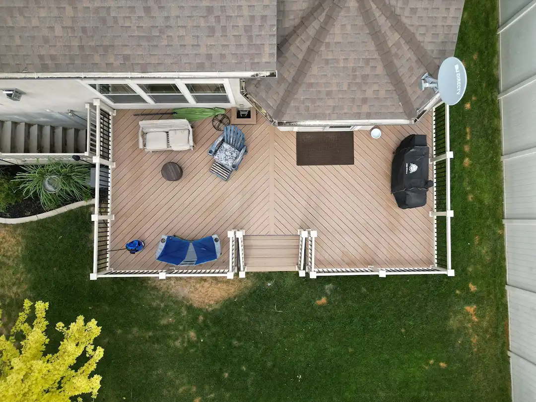 Aerial photo of a composite deck and railing to support Envision Decking.