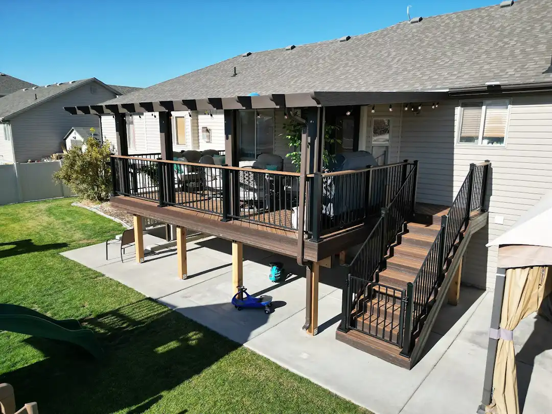 Photo of a deck with deck railing and steps.